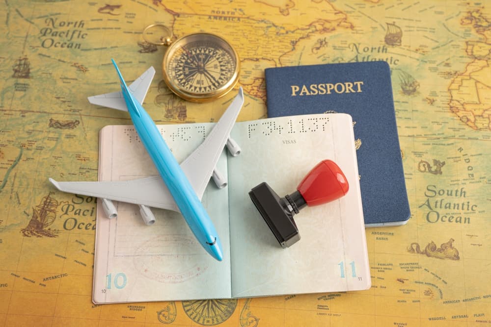 Approved Stamp visa and passport document to immigration at airport in country.