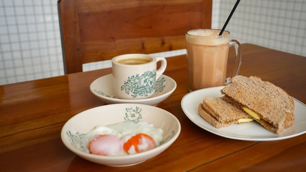 Traditional kopi and kaya toast breakfast