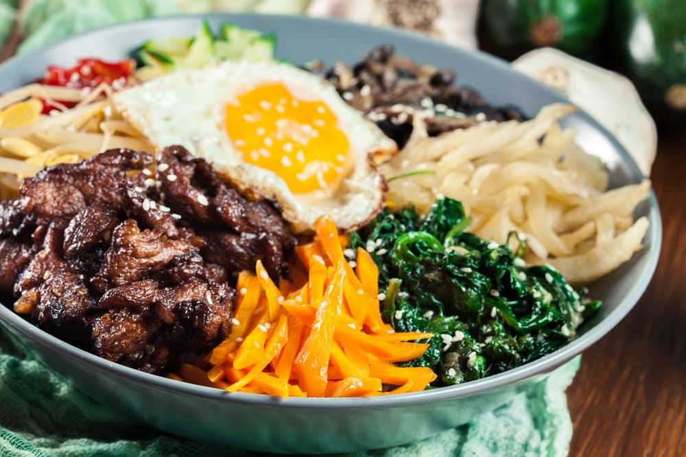 Bibimbap - rice with beef and vegetables. Traditional Korean dish.