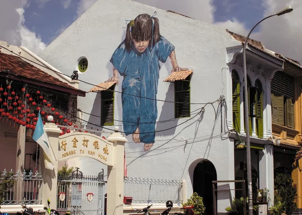 Street-Art-by-Ernest-Zacharevic-in-Penang-Malaysia-