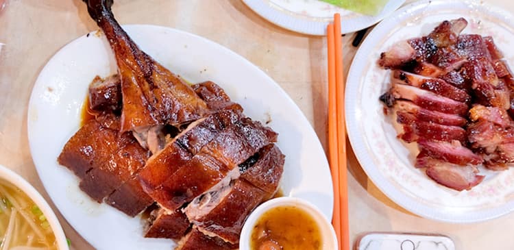 Scopri i sapori unici di Hong Kong: ristoranti stellati Michelin e tesori nascosti.